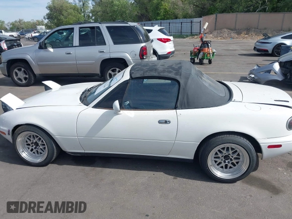 1992 Mazda MX-5 Miata with VIN JM1NA3513N0308521, listed as a IAAI auction lot 42225665 with 235,947 mi miles and . Bid and sale history available at DreamBid. Image 14.