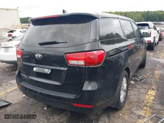 2017 Kia Sedona L with VIN KNDMA5C14H6259003, listed as a IAAI auction lot 40433286 with 1 mi miles. Bid and sale history available at carsss.com. Image 4.
