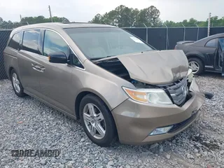 2011 Honda Odyssey Touring с VIN 5FNRL5H98BB095796, выставлен на аукционе IAAI как лот 42094695 с пробегом 158 410 миль миль и . История ставок и продаж доступна на DreamBid. Изображение 1.