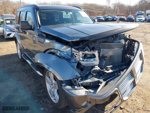 2011 Dodge Nitro Heat with VIN 1D4PU4GX9BW607188, listed as a IAAI auction lot 41100616 with 86,062 mi miles. Bid and sale history available at carsss.com. Image 6.