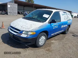 2000 Dodge Caravan SE z VIN 1B4GP44R4YB724460, wystawiony jako IAAI lot #41974976 z przebiegiem 122 815 mil mil oraz . Historia ofert i sprzedaży dostępna na DreamBid. Obrazek 2.