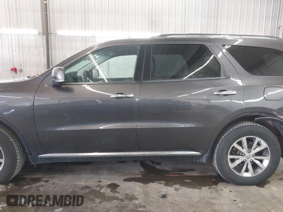 2016 Dodge Durango Limited with VIN 1C4RDJDG2GC331650, listed as a IAAI auction lot 41639192 with 132,269 mi miles and . Bid and sale history available at DreamBid. Image 14.