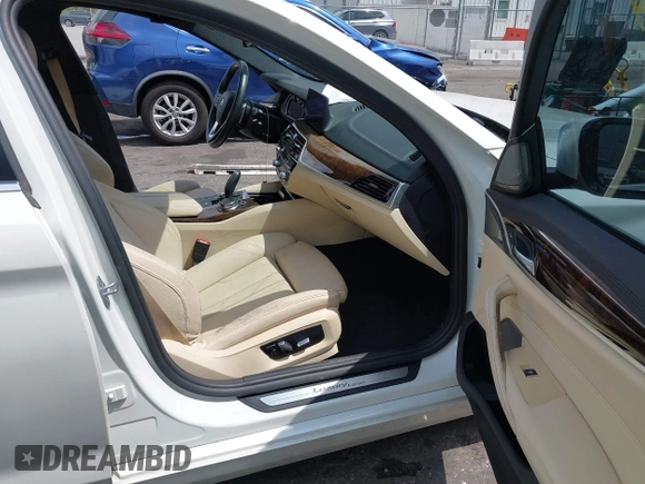 2018 BMW 5 Series 530i with VIN WBAJA5C55JWA38747, listed as a IAAI auction lot 41922937 with 100,951 mi miles and . Bid and sale history available at DreamBid. Image 5.
