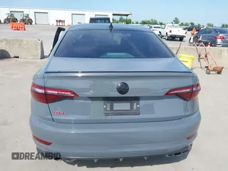 2020 Volkswagen Jetta GLI S z VIN 3VW6T7BU0LM047800, wystawiony jako IAAI lot #42263748 z przebiegiem 58 903 mil mil oraz . Historia ofert i sprzedaży dostępna na DreamBid. Obrazek 16.