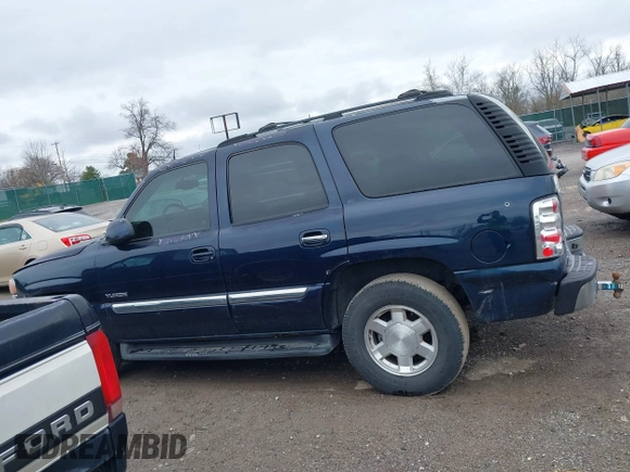 2005 GMC Yukon SLT with VIN 1GKEC13T45J139885, listed as a IAAI auction lot 41796394 with 229,494 mi miles. Bid and sale history available at carsss.com. Image 14.