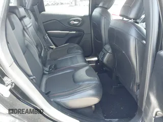 2017 Jeep Cherokee Trailhawk with VIN 1C4PJMBS9HW537962, listed as a IAAI auction lot 42002460 with 129,037 mi miles and . Bid and sale history available at DreamBid. Image 8.