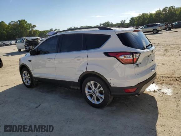 2018 Ford Escape SE with VIN 1FMCU0GD6JUA73082, listed as a Copart auction lot 50879005 with 148,900 mi miles and Salvage Title. Bid and sale history available at carsss.com. Image 2.