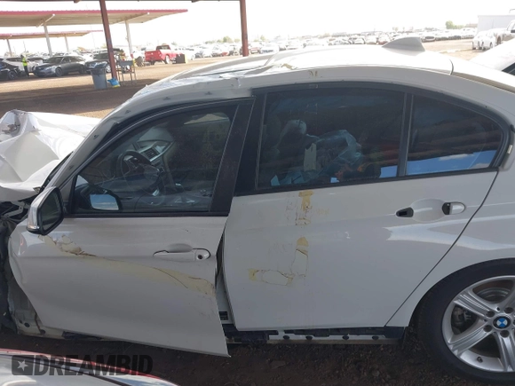 2014 BMW 3 Series 328i with VIN WBA3C1C53EK113046, listed as a IAAI auction lot 42665663 with Not provided miles and . Bid and sale history available at DreamBid. Image 14.