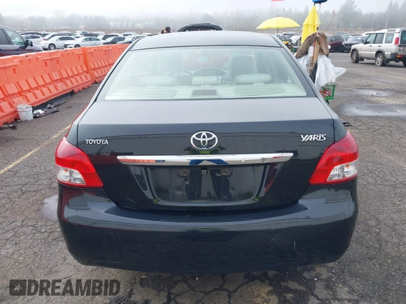2008 Toyota Yaris with VIN JTDBT903284012329, listed as a IAAI auction lot 41879489 with 117,041 mi miles. Bid and sale history available at carsss.com. Image 16.