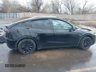 2023 Tesla Model Y Long Range with VIN 7SAYGDEE5PF766685, listed as a IAAI auction lot 41933729 with 25,959 mi miles and . Bid and sale history available at DreamBid. Image 12.
