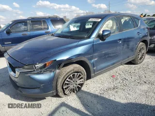 2021 Mazda CX-5 Sport with VIN JM3KFABM1M0414219, listed as a Copart auction lot 44918385 with 40,206 mi miles and Salvage Title. Bid and sale history available at carsss.com. Image 1.