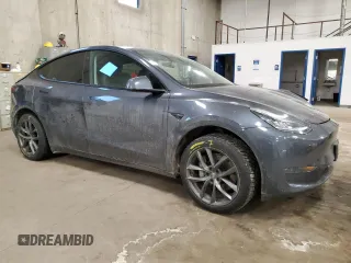 2023 Tesla Model Y Long Range with VIN 7SAYGDEE8PA034239, listed as a Copart auction lot 46429785 with 66,944 mi miles and Non Repairable. Bid and sale history available at DreamBid. Image 4.