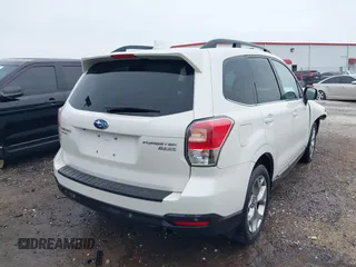 2017 Subaru Forester Touring with VIN JF2SJAWCXHH501702, listed as a IAAI auction lot 42080564 with 188,392 mi miles and . Bid and sale history available at DreamBid. Image 4.