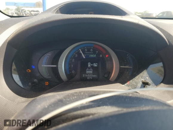 2010 Honda Insight EX with VIN JHMZE2H79AS023173, listed as a Copart auction lot 58087275 with 216,322 mi miles and Salvage title. Bid and sale history available at DreamBid. Image 9.