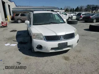 2011 Mitsubishi Endeavor LS z VIN 4A4JN2AS4BE032045, wystawiony jako Copart lot #49264925 z przebiegiem 128 393 mil mil oraz Szkoda całkowita • Salvage title. Historia ofert i sprzedaży dostępna na DreamBid. Obrazek 12.