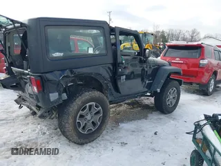 2013 Jeep Wrangler Rubicon 10th Anniversary with VIN 1C4BJWCG3DL591186, listed as a IAAI auction lot 41315969 with 54,984 mi miles and . Bid and sale history available at DreamBid. Image 4.