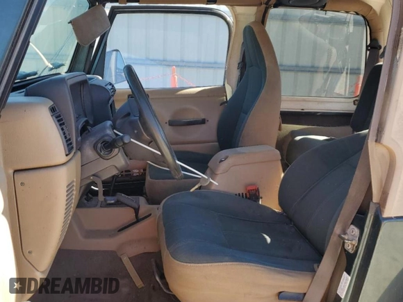 2002 Jeep Wrangler Sahara with VIN 1J4FA59S02P761365, listed as a Copart auction lot 81899144 with 208,429 mi miles and Salvage title. Bid and sale history available at DreamBid. Image 7.