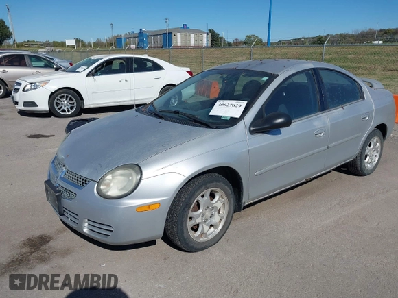 2003 Dodge Neon SXT with VIN 1B3ES56C43D215636, listed as a IAAI auction lot 40627629 with 121,237 mi miles. Bid and sale history available at carsss.com. Image 2.