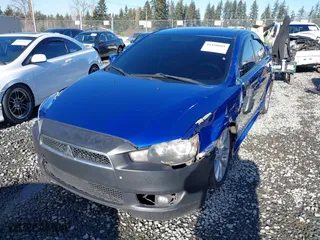 2011 Mitsubishi Lancer ES with VIN JA32U2FU8BU042901, listed as a IAAI auction lot 41450601 with 161,129 mi miles. Bid and sale history available at carsss.com. Image 2.