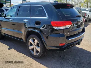 2014 Jeep Grand Cherokee Overland with VIN 1C4RJFCT7EC187319, listed as a Copart auction lot 55284615 with 98,314 mi miles and Clean Title. Bid and sale history available at DreamBid. Image 3.