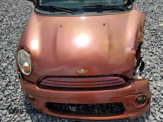 2011 MINI Hardtop with VIN WMWSU3C52BT094399, listed as a Copart auction lot 56561635 with 94,428 mi miles and Salvage Title. Bid and sale history available at DreamBid. Image 11.