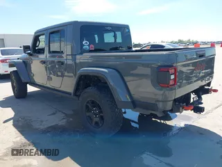 2021 Jeep Gladiator Mojave with VIN 1C6JJTEG8ML515686, listed as a IAAI auction lot 42217590 with 38,506 mi miles and . Bid and sale history available at DreamBid. Image 3.