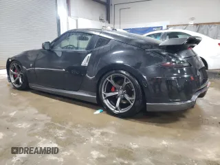 2014 Nissan 370Z Nismo with VIN JN1AZ4EHXEM633754, listed as a Copart auction lot 82035784 with 55,793 mi miles and Salvage Title. Bid and sale history available at DreamBid. Image 2.