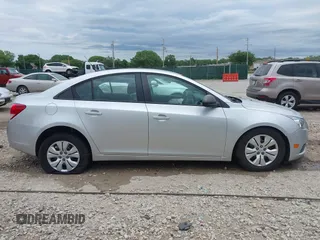 2014 Chevrolet Cruze LS with VIN 1G1PA5SG7E7154005, listed as a IAAI auction lot 42341299 with 76,981 mi miles and . Bid and sale history available at DreamBid. Image 13.