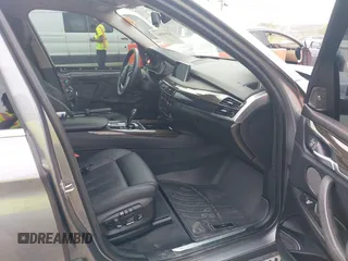 2016 BMW X5 xDrive35i z VIN 5UXKR0C53G0P19015, wystawiony jako IAAI lot #41930862 z przebiegiem 150 762 mil mil oraz . Historia ofert i sprzedaży dostępna na DreamBid. Obrazek 5.