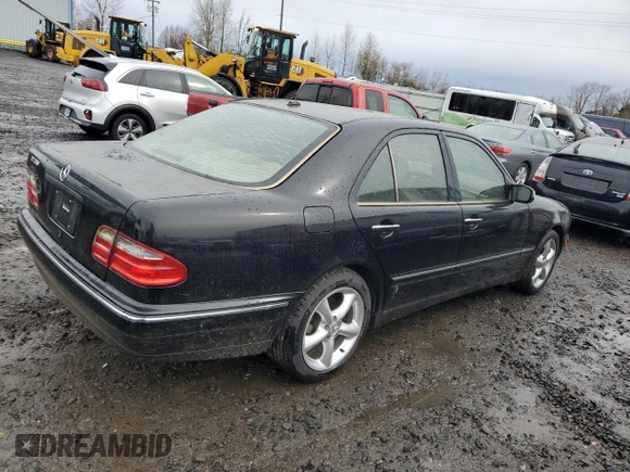 2001 Mercedes-Benz E-Class with VIN WDBJF70J31B324620, listed as a Copart auction lot 47748555 with 160,041 mi miles and Salvage Title. Bid and sale history available at carsss.com. Image 3.
