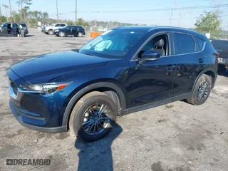 2019 Mazda CX-5 Touring with VIN JM3KFACM5K1608354, listed as a IAAI auction lot 41675828 with NaN miles. Bid and sale history available at carsss.com. Image 17.