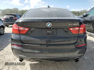 2017 BMW X4 M40i with VIN 5UXXW7C51H0U25766, listed as a Copart auction lot 77749324 with 101,289 mi miles and Salvage Title. Bid and sale history available at carsss.com. Image 6.