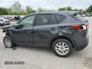 2014 Mazda CX-5 Touring z VIN JM3KE4CY2E0368729, wystawiony jako Copart lot #55563645 z przebiegiem 204 521 mil mil oraz Szkoda całkowita • Salvage title. Historia ofert i sprzedaży dostępna na DreamBid. Obrazek 2.