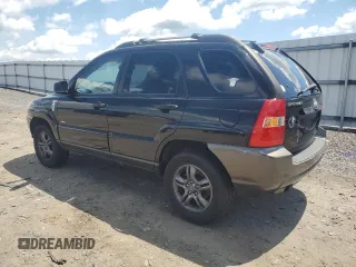 2005 Kia Sportage LX z VIN KNDJE723657121717, wystawiony jako Copart lot #61407575 z przebiegiem Nie podano mil oraz Czysty tytuł • Clean title. Historia ofert i sprzedaży dostępna na DreamBid. Obrazek 2.