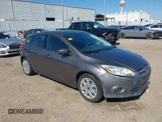 2012 Ford Focus SE z VIN 1FAHP3K29CL475962, wystawiony jako IAAI lot #41969002 z przebiegiem 110 055 mil mil oraz . Historia ofert i sprzedaży dostępna na DreamBid. Obrazek 1.