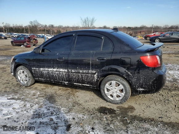 2010 Kia Rio LX with VIN KNADH4A39A6651648, listed as a Copart auction lot 42202755 with 32,617 mi miles and Salvage Title. Bid and sale history available at carsss.com. Image 2.