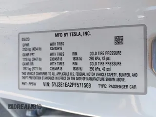 2023 Tesla Model 3 with VIN 5YJ3E1EA2PF571569, listed as a IAAI auction lot 42288715 with 30,271 mi miles and . Bid and sale history available at DreamBid. Image 9.