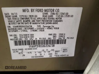 2013 Ford Taurus Limited z VIN 1FAHP2F85DG226738, wystawiony jako Copart lot #58322025 z przebiegiem 212 748 mil mil oraz Szkoda całkowita • Salvage title. Historia ofert i sprzedaży dostępna na DreamBid. Obrazek 13.