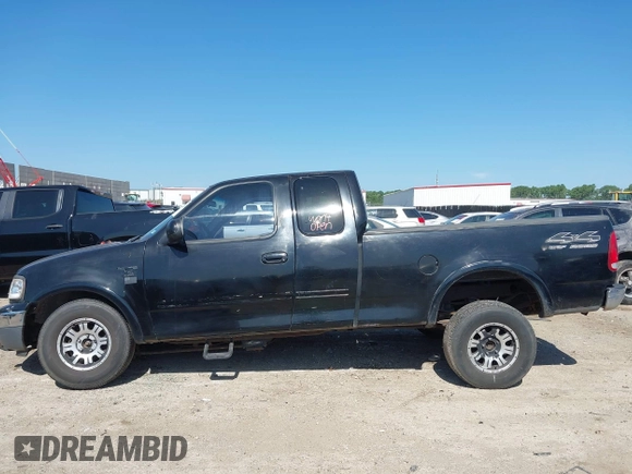 1999 Ford F-150 XL with VIN 1FTRX18L3XKA77743, listed as a IAAI auction lot 42512532 with Not provided miles and . Bid and sale history available at DreamBid. Image 15.