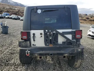 2009 Jeep Wrangler Unlimited Rubicon with VIN 1J8GA69139L703848, listed as a Copart auction lot 43614645 with 172,801 mi miles and Salvage title. Bid and sale history available at DreamBid. Image 6.