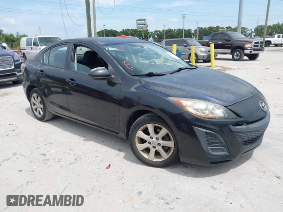 2011 Mazda Mazda3 i Touring with VIN JM1BL1VFXB1472772, listed as a IAAI auction lot 42180030 with 128,438 mi miles. Bid and sale history available at carsss.com. Image 1.
