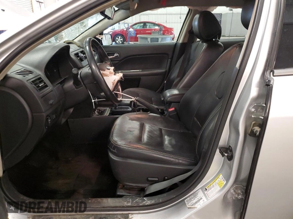 2012 Ford Fusion SEL with VIN 3FAHP0JG2CR274840, listed as a Copart auction lot 62123135 with 122,517 mi miles and Salvage title. Bid and sale history available at DreamBid. Image 7.