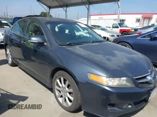 2006 Acura TSX Navi z VIN JH4CL96926C026104, wystawiony jako IAAI lot #42100971 z przebiegiem 170 197 mil mil oraz . Historia ofert i sprzedaży dostępna na DreamBid. Obrazek 1.