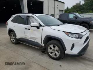 2019 Toyota RAV4 XLE with VIN 2T3P1RFV6KC060285, listed as a Copart auction lot 59195955 with 136,942 mi miles and Salvage title. Bid and sale history available at DreamBid. Image 4.