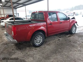 2015 Nissan Frontier SV with VIN 1N6AD0ER7FN711493, listed as a IAAI auction lot 41761772 with 265,000 mi miles. Bid and sale history available at carsss.com. Image 4.