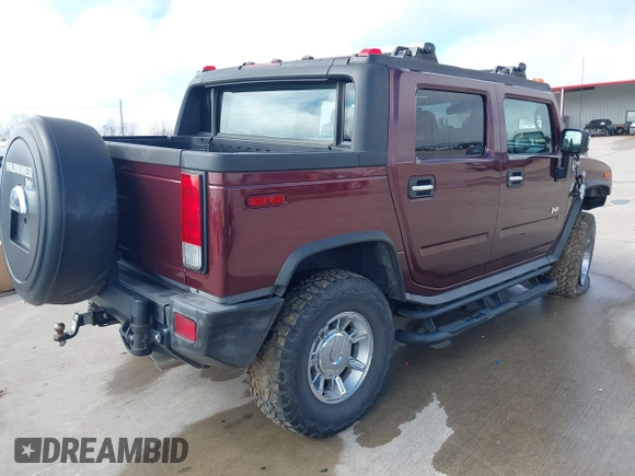 2006 Hummer H2 with VIN 5GRGN22U66H104237, listed as a IAAI auction lot 41665284 with 61,984 mi miles. Bid and sale history available at carsss.com. Image 4.