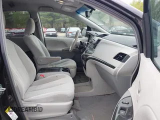 2014 Toyota Sienna LE AAS with VIN 5TDKK3DC0ES487830, listed as a IAAI auction lot 42216342 with 155,973 mi miles and . Bid and sale history available at carsss.com. Image 5.