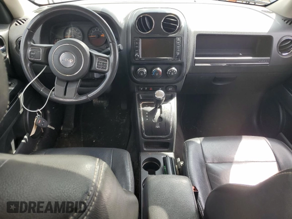 2015 Jeep Patriot High Altitude with VIN 1C4NJPFA4FD192777, listed as a Copart auction lot 54716275 with 104,368 mi miles and Salvage title. Bid and sale history available at DreamBid. Image 8.