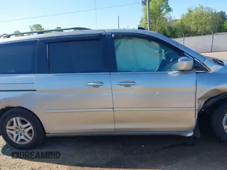 2005 Honda Odyssey EX-L z VIN 5FNRL38715B014905, wystawiony jako IAAI lot #41986395 z przebiegiem 191 029 mil mil oraz . Historia ofert i sprzedaży dostępna na DreamBid. Obrazek 13.