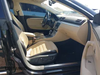 2013 Volkswagen CC Sport with VIN WVWBN7AN9DE518789, listed as a IAAI auction lot 41915400 with 114,847 mi miles. Bid and sale history available at carsss.com. Image 5.